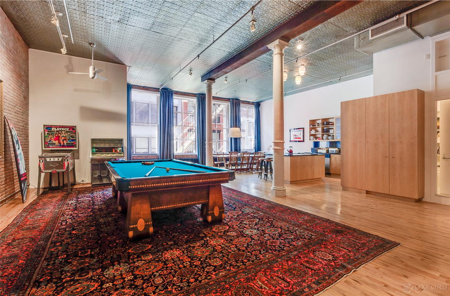 Vintage pinball machines and a jukebox are some of the other playful decorations in the loft.