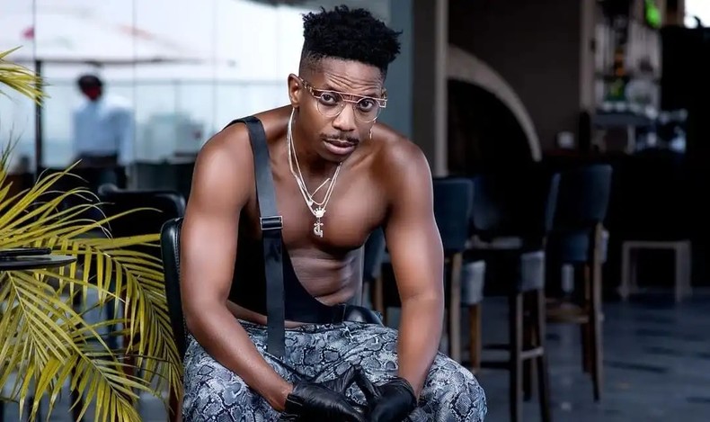 Eric Omondi poses for a photo during a past photoshoot