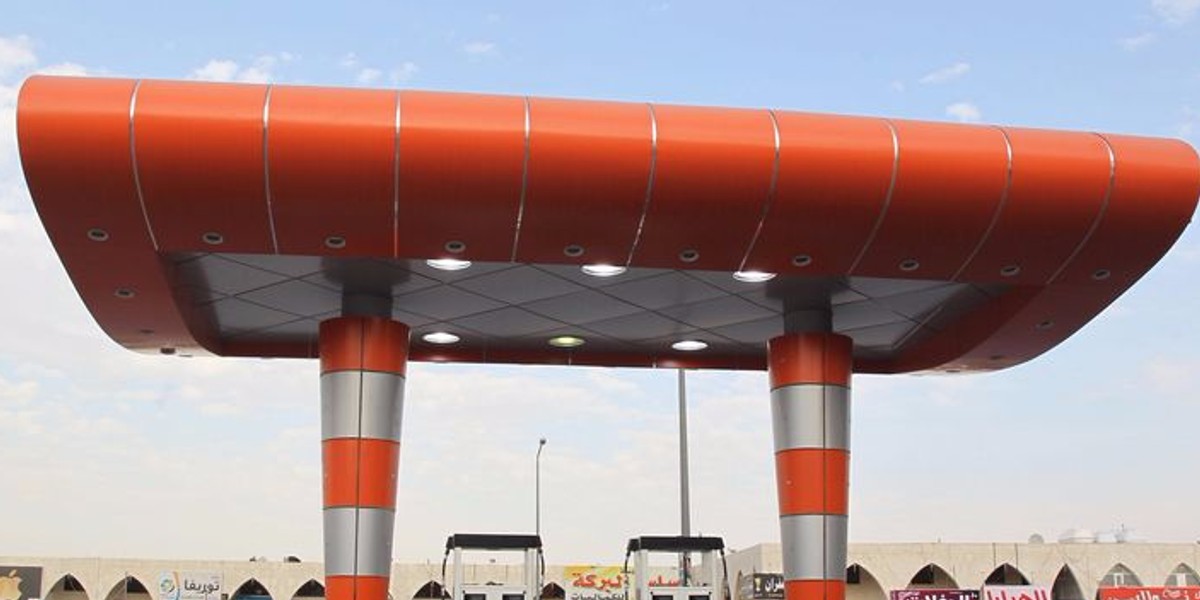 A driver waits to fill his car at a station in Riyadh, Saudi Arabia.