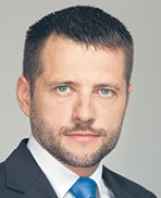 Łukasz Chruściel radca prawny, partner kierujący biurem Kancelarii Raczkowski Paruch w Katowicach