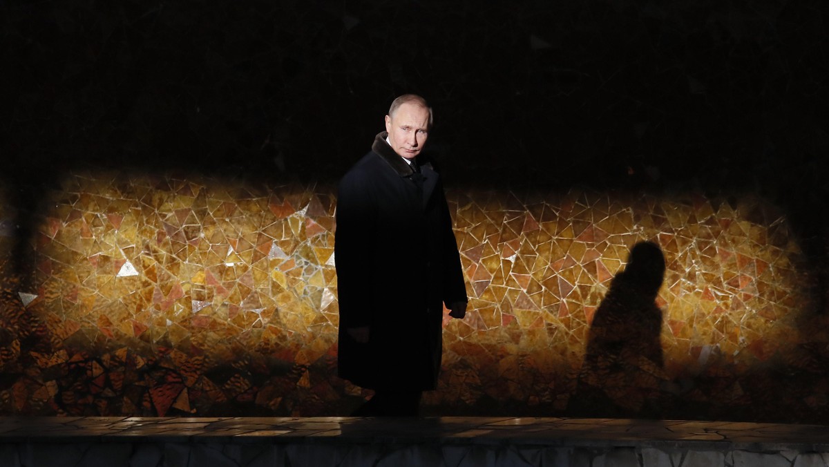 Russian President Putin attends a wreath laying ceremony at the eternal flame during an event to com