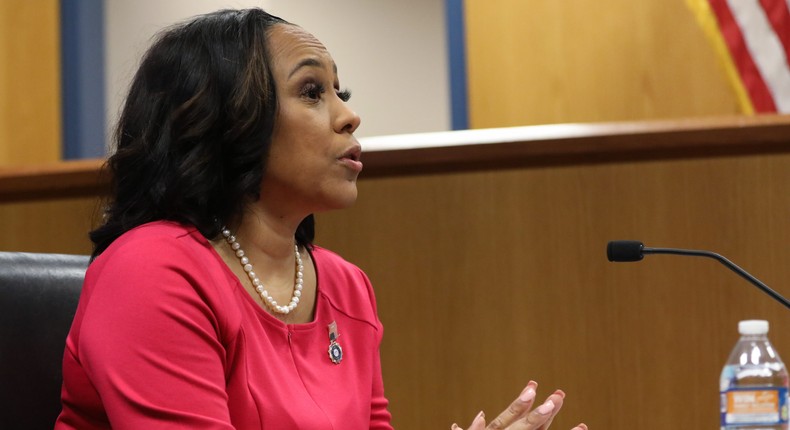 ATLANTA, GA - FEBRUARY 15: Fulton County District Attorney Fani Willis testifies during a hearing in the case of the State of Georgia v. Donald John Trump at the Fulton County Courthouse on February 15, 2024 in Atlanta, Georgia. Judge Scott McAfee is hearing testimony as to whether Willis and Special Prosecutor Nathan Wade should be disqualified from the case for allegedly lying about a personal relationship. (Photo by Alyssa Pointer-Pool/Getty Images)Pool