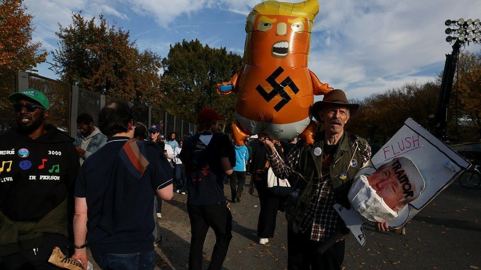 Kako pristalice Kamale Haris vide Trampa | Foto: Reuters