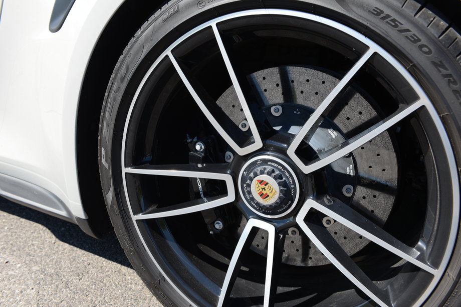 The Porsche 911 Turbo S Cabriolet can accelerate almost like a bullet, but it can also brake effectively.  This is due to the excellent carbon-ceramic brakes.