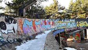 The partially dismantled bobsleigh track which was damaged during past conflicts lies abandoned on Mount Trebevic, near Sarajevo on February 6, 2024.ELVIS BARUKCIC/AFP/Getty Images