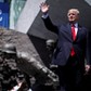 U.S. President Donald Trump waves as he arrives to hold a public speech in front of the Warsaw Upris