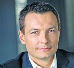 Łaniewski: Prowizje na rynku kart powinna regulować ustawa