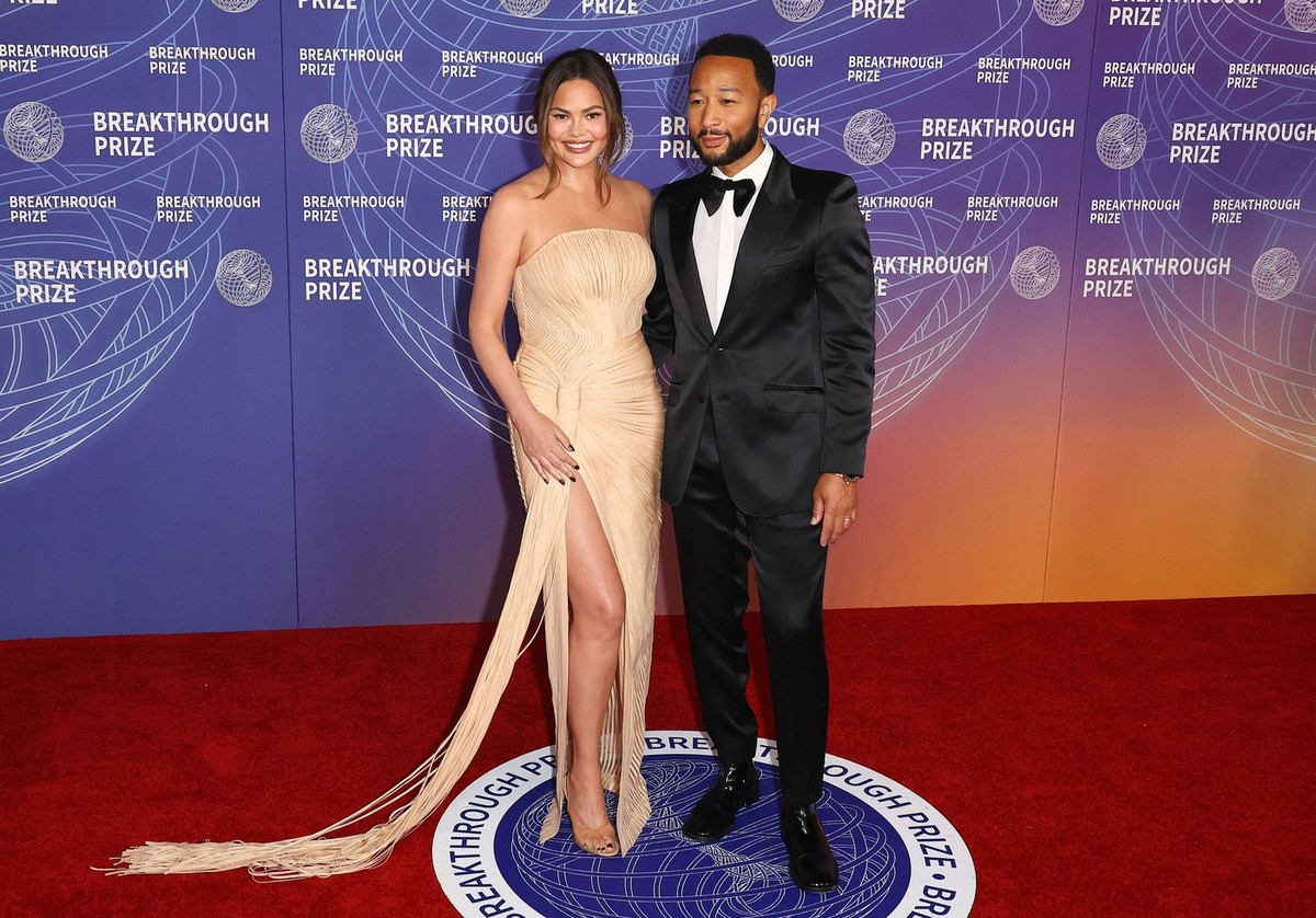 Krisi Tajgen i Džon Ledžend