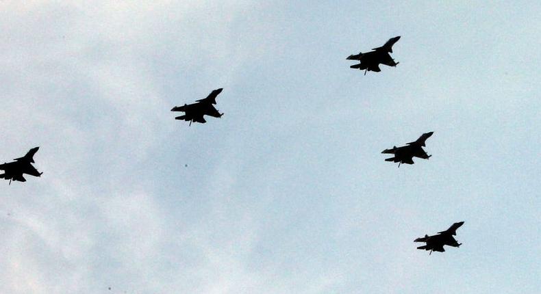 Chinese J-15 fighter jets at a military parade
