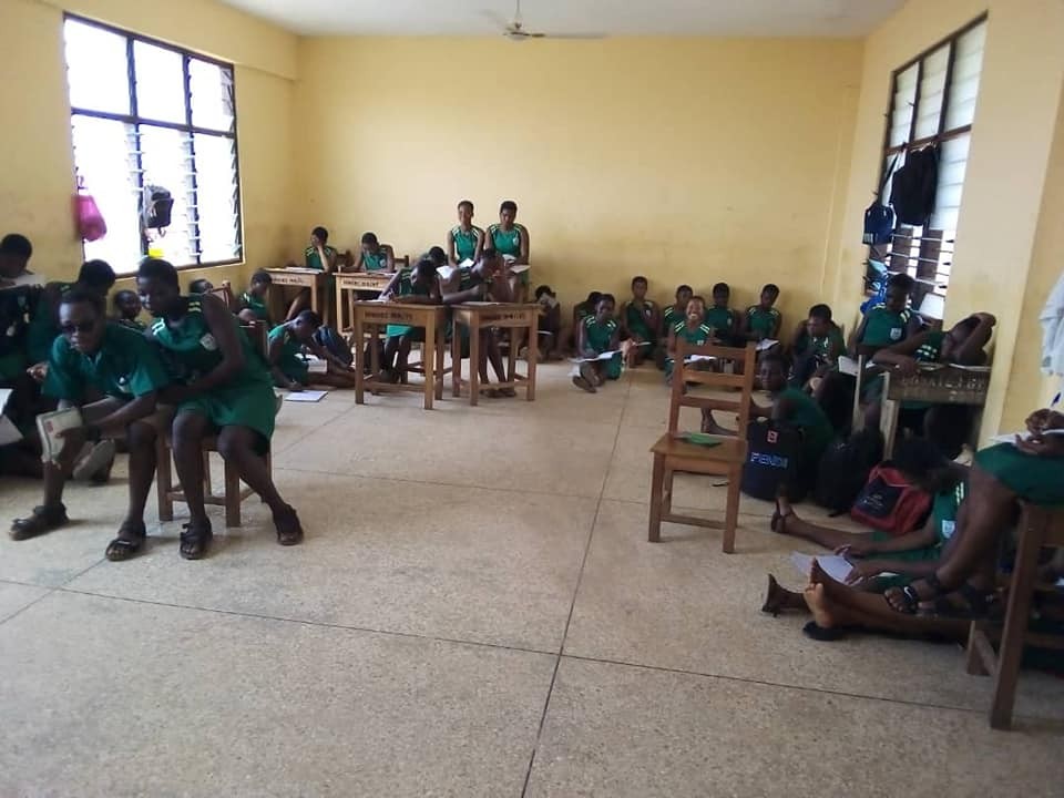 Photos Lack of furniture forces Ningo SHS students to sit on bare