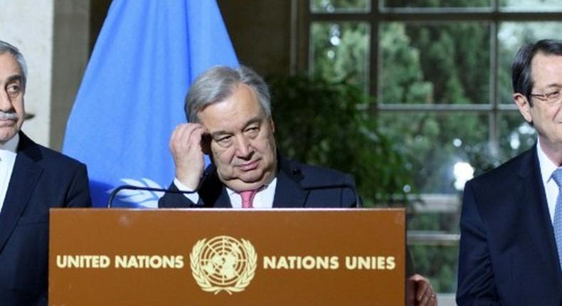 UN Secretary-General Antonio Guterres (C) next to Turkish Cypriot leader Mustafa Akinci (L) and Greek Cypriot President Nicos Anastasiades (R) listen to questions following the UN-sponsored Cyprus peace talks on January 12, 2017 in Geneva