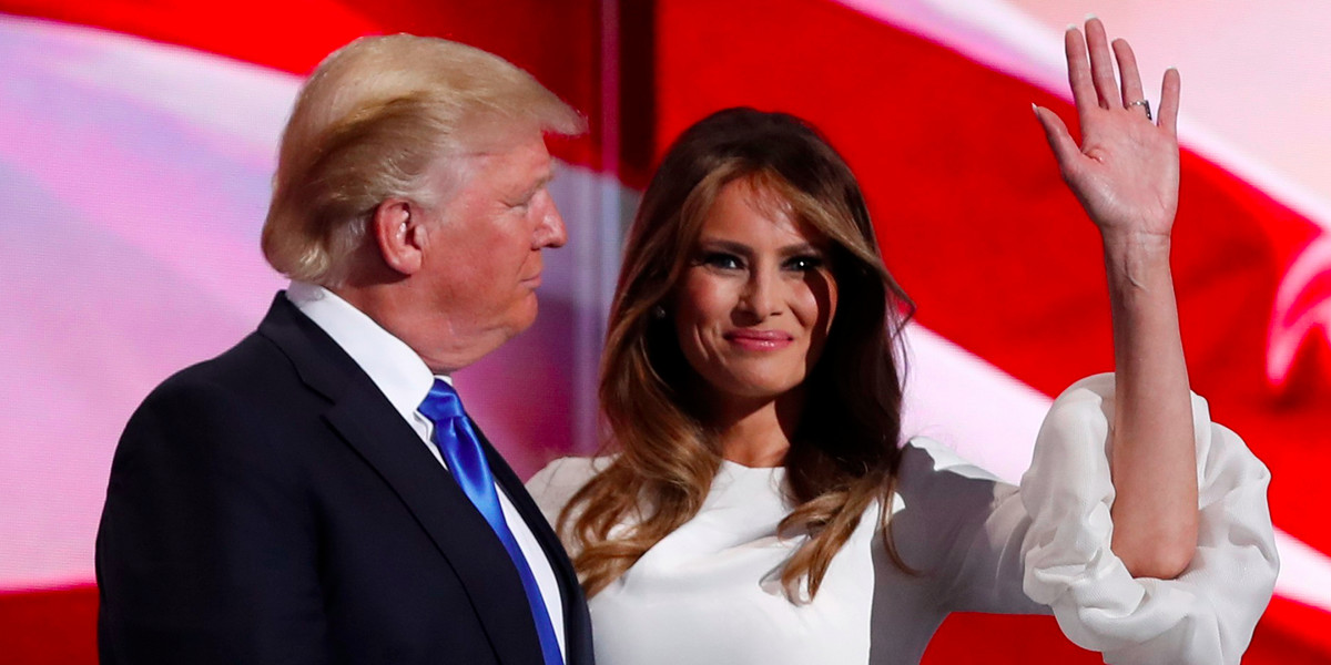 Melania Trump stands with her husband Republican U.S. presidential candidate Donald Trump.