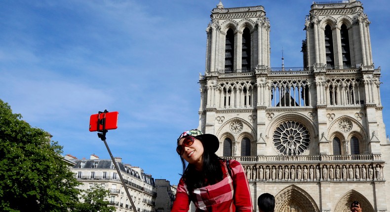 Notre Dame Cathedral in Paris, France chinese tourist