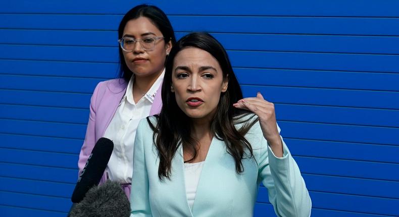 U.S. Rep. Alexandria Ocasio-Cortez, right, and Democratic Congressional candidate Jessica Cisneros speak to the media before a rally, Saturday, Feb. 12, 2022, in San Antonio.