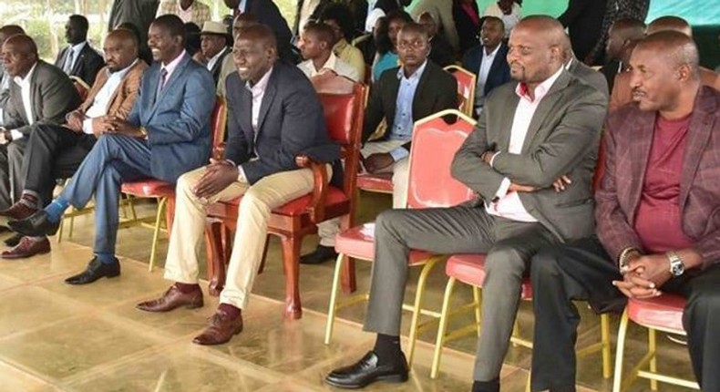 File image of DP Ruto flanked by Moses Kuria and Jackson Mandago