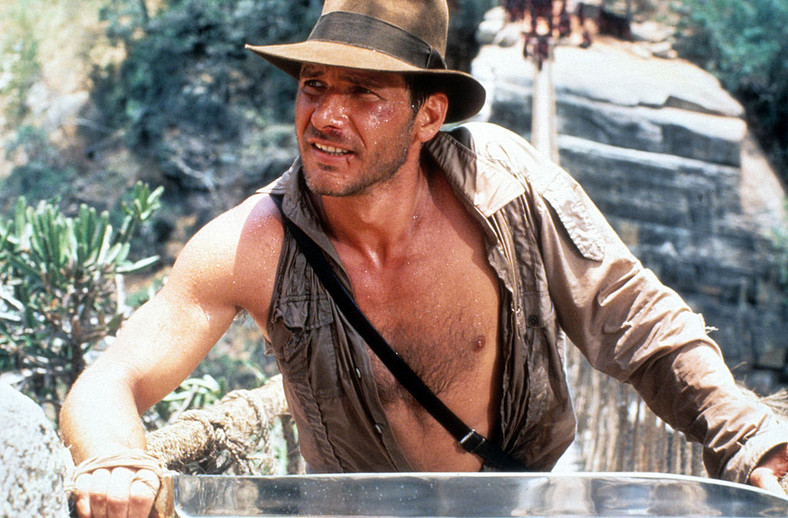 Harrison Ford w filmie "Indiana Jones i Świątynia Zagłady"