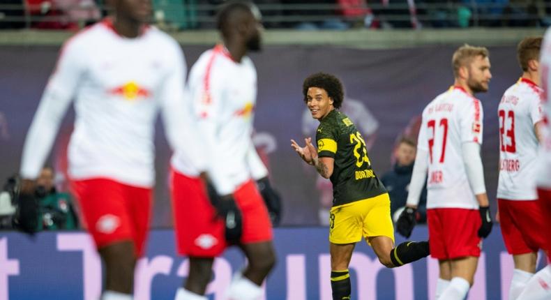 Belgium midfielder Axel Witsel celebrates scoring the winner in Borussia Dortmund's 1-0 victory at RB Leipzig which left them six points clear at the top of the Bundesliga table ahead of defending champions Bayern Munich