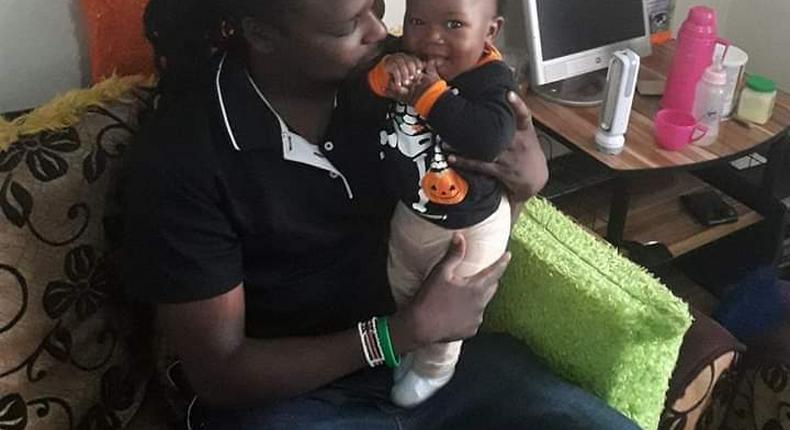 Baby Ethan Muendo with his father, KBC journalist Jonathan Muendo (Twitter)