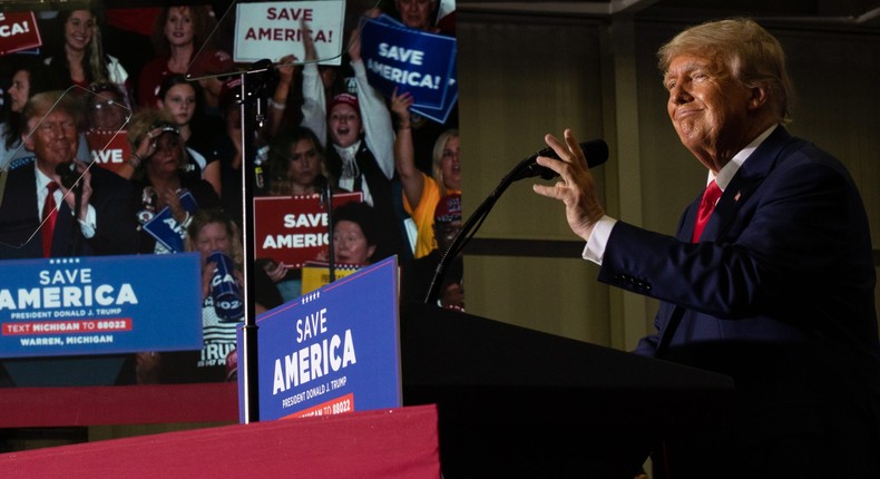 Former President Donald Trump speaks during a Save America rally on October 1, 2022 in Warren, Michigan. Trump has endorsed Republican gubernatorial candidate Tudor Dixon, Secretary of State candidate Kristina Karamo, Attorney General candidate Matthew DePerno, and Republican businessman John James ahead of the November midterm election.