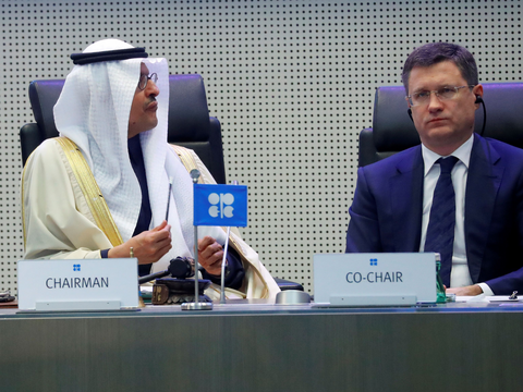 FILE PHOTO: Saudi Arabia's Minister of Energy Prince Abdulaziz bin Salman Al-Saud and Russia's Energy Minister Alexander Novak are seen at the beginning of an OPEC and NON-OPEC meeting in Vienna, Austria December 6, 2019. REUTERS/Leonhard Foeger/File Photo