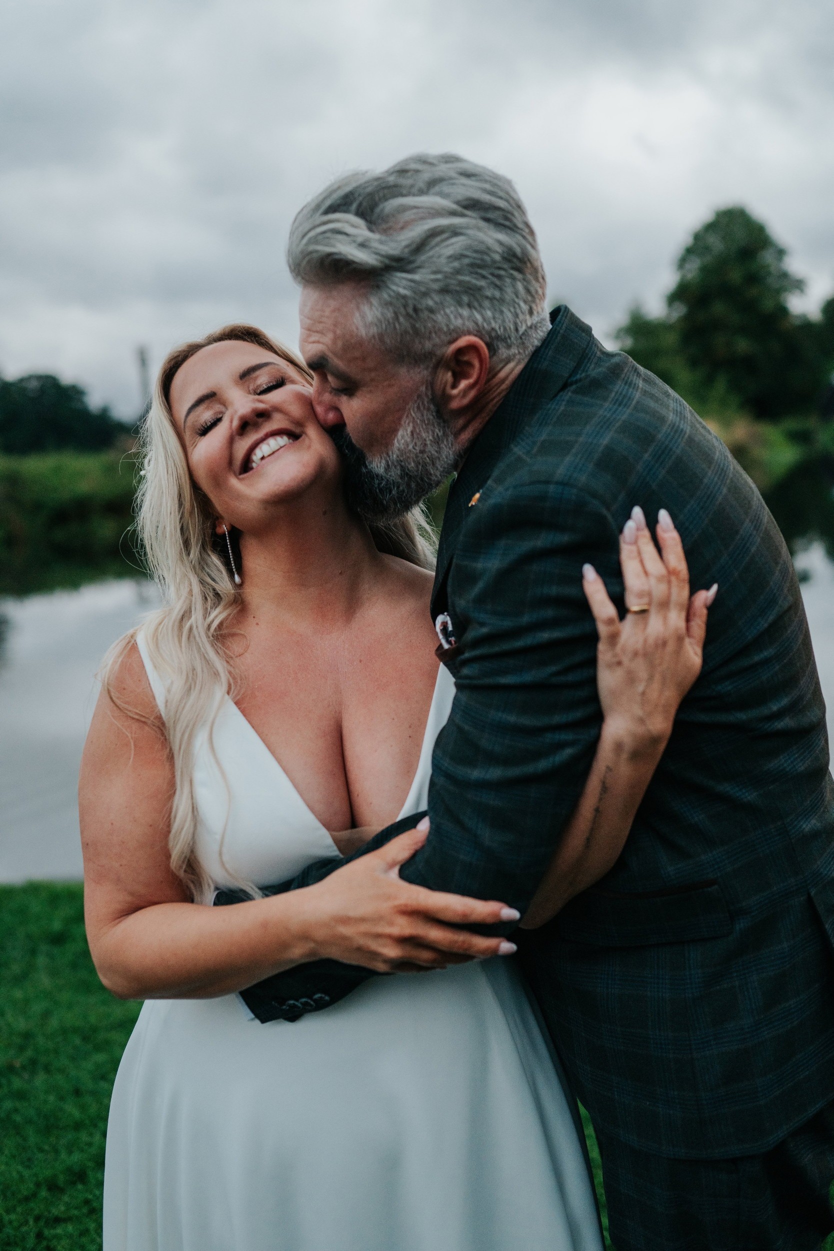Newlyweds fall into river during wedding photoshoot