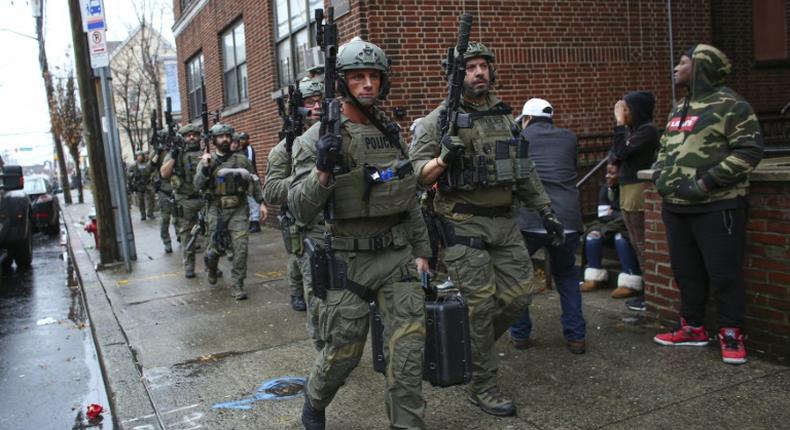 Hundreds of police from New Jersey and New York, including tactical officers, were deployed during the hours-long shooting in Jersey City, New Jersey