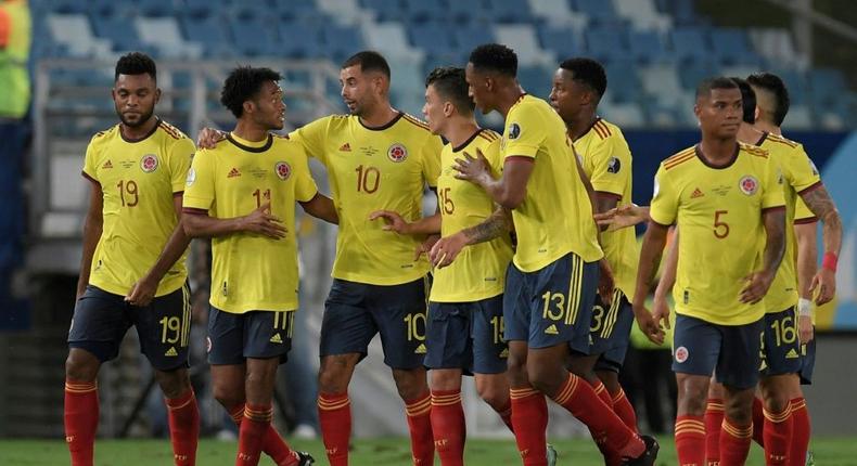 Edwin Cardona (3rd left) and his Colombia teammates celebrate the winning goal against Ecuador Creator: DOUGLAS MAGNO