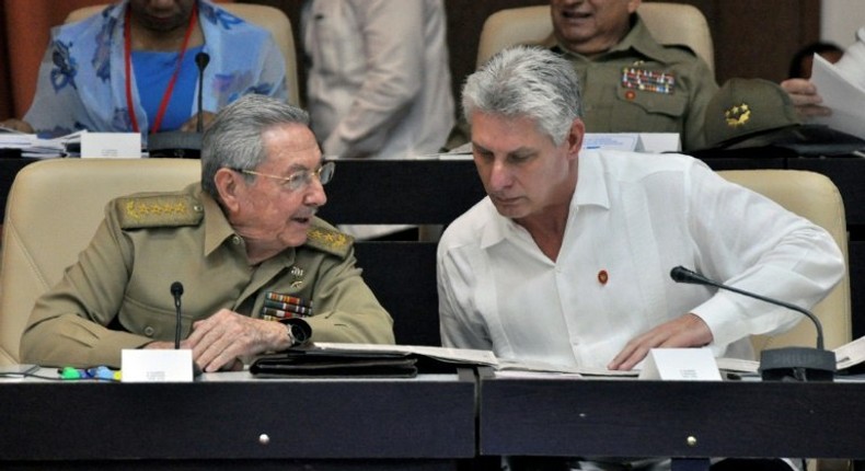 Cuban President Raul Castro (L) and First Vice president Miguel Diaz-Canel speak during the Permanent Working Committees of the National Assembly of the People's Power in Havana, on July 14, 2017