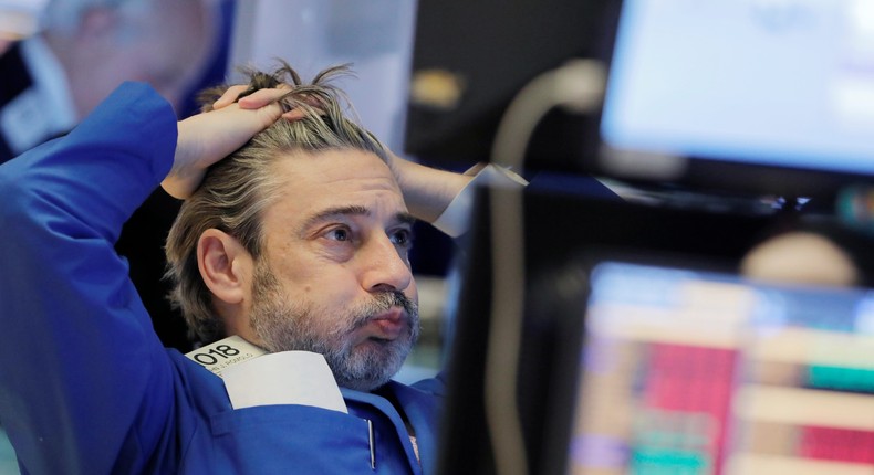 A trader works on the floor at the New York Stock Exchange (NYSE) in New York City, U.S., March 5, 2020.Andrew Kelly/Reuters