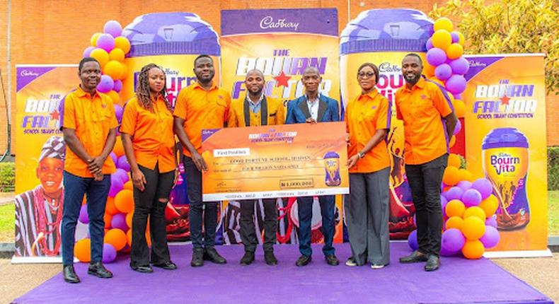 L-R: Brand Manager, Cocoa beverages, Cadbury Ghana Plc, Godfred Mawugbe; Head of Marketing for Cadbury West Africa, Morolake Emokpaire; Brand Manager, Beverages and Biscuits, Cadbury Nigeria Plc, Michael Boateng; Representatives of Good Fortune School from Ibadan, Oyo State, Winner of Bournfactor; Managing Director of Cadbury West Africa, Oyeyimika Adeboye; Category Manager Beverages and Biscuits, Cadbury Nigeria Plc, at Cadbury’s Headquarters in Lagos.