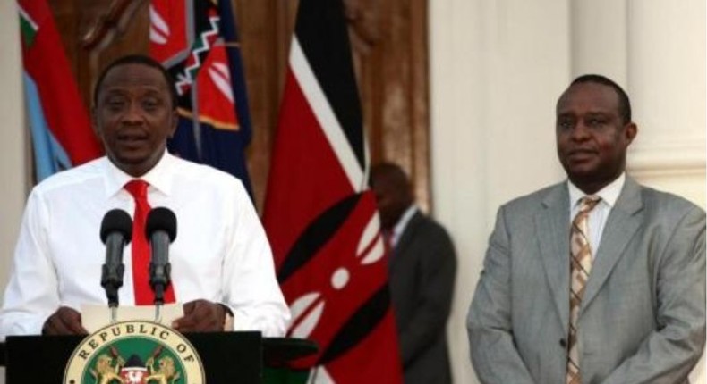 President Uhuru Kenyatta and CS Treasury Hentry Rotich. The government has redeployed accountant officers who have qualified president's order on lifestyle audit