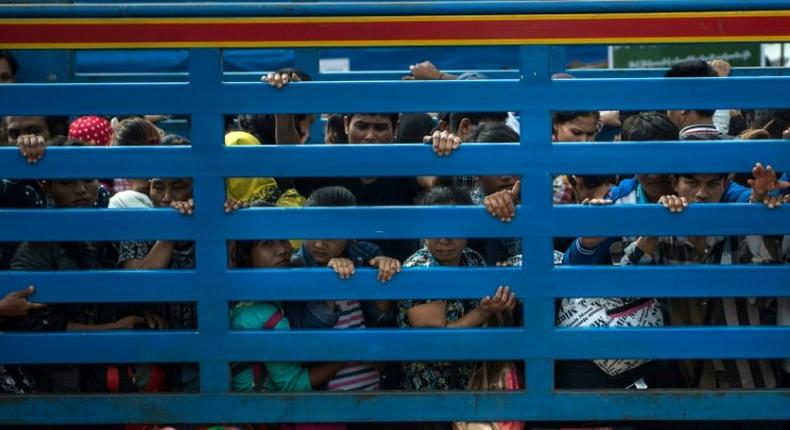 Tens of thousands of Myanmar migrants have fled Thailand in fear of a new law that hardens penalties on the millions of undocumented migrant workers underpinning its economy