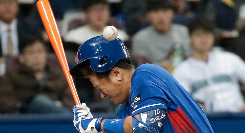 South Korea's Lee Dae-ho was hit by a pitch off Taiwan's pitcher Pan Wei-lun during the second inning of their first-round game of the World Baseball Classic at Gocheok Sky Dome in Seoul, South Korea.