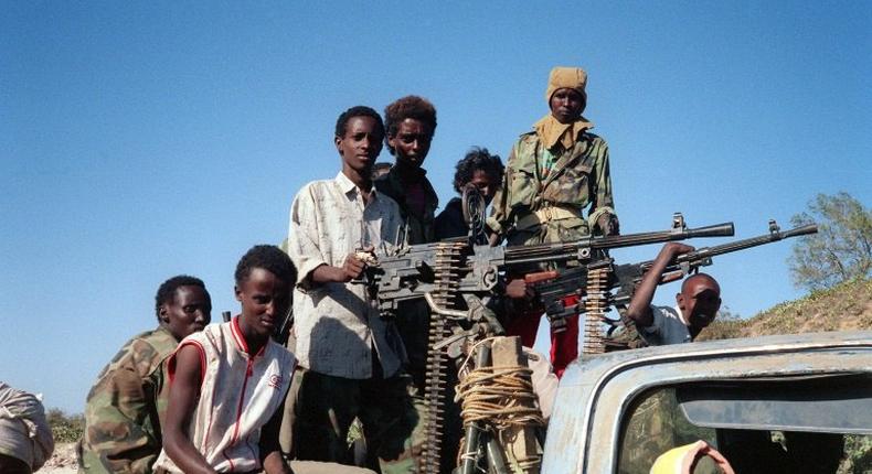 Somali rebel fighters from the Salvation democratic Front move in their military vehicule in March 1991 in Bufo, 85 kilometers of Mogadiscio