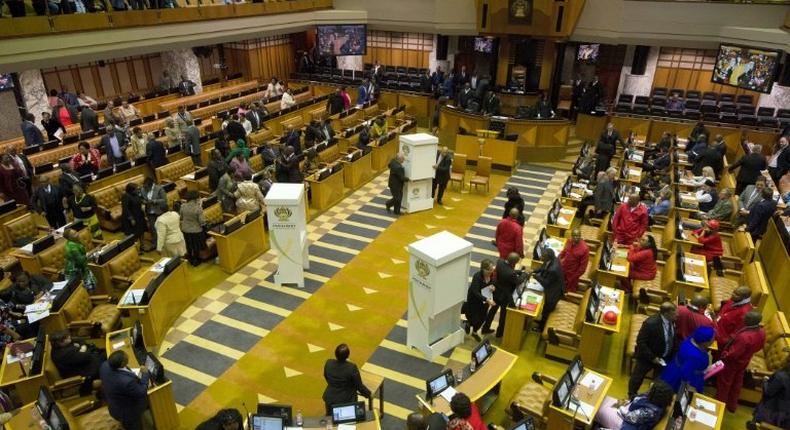 A voting booth is brought into the South African parliament to allow Members of Parliament to vote for or against the motion of no-confidence against South African president Jacob Zuma