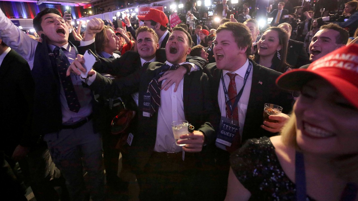 Supporters of U.S. Republican presidential nominee Donald Trump react at his election night rally in Manhattan