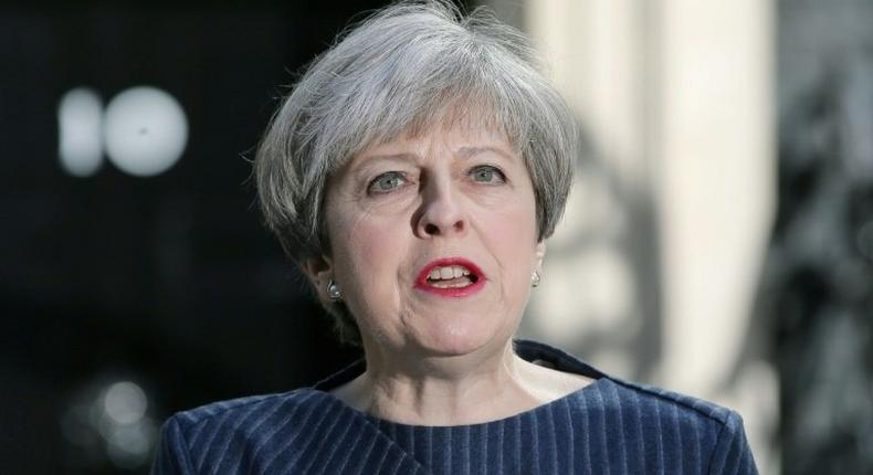 British Prime Minister Theresa May makes an announcement to the media outside 10 Downing Street in central London on April 18, 2017