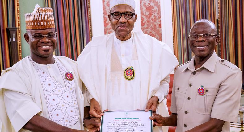 The re-elected Governor of Kogi, Yahaya Bello presented his Certificate of Return to President Muhammadu Buhari in the presence of Adams Oshiomhole, National Chairman of the All Progressives Congress (APC). [Twitter/@BashirAhmaad]