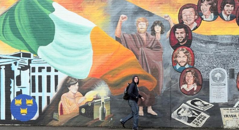 Murals on the Catholic Falls Road in Belfast, scene of relative peace for the past 20 years