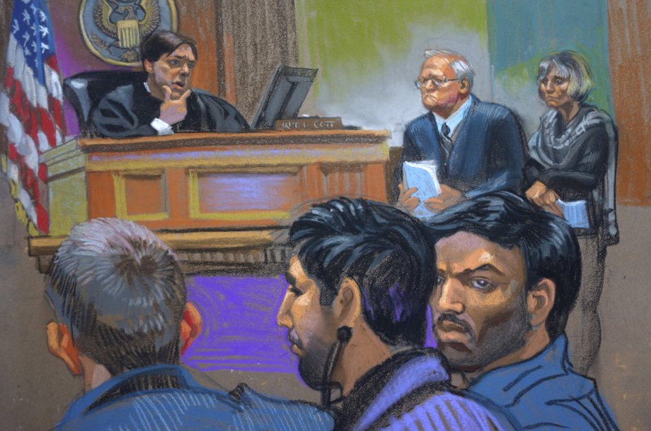 Judge James Cott, attorneys John J. Reilly, center, and Rebekah J. Poston, right, with defendants Efrain Antonio Campo Flores, right foreground, and Franqui Francisco Flores de Freitas, center foreground, during a hearing in US District Court in the Manhattan borough of New York in this courtroom sketch from November 12, 2015.