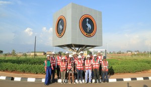 EfD-Mak Team and Inclusive Green Economy (IGE) Fellows pose for a group photo at the Kiira Motors Corporation (KMC) plant in Jinja