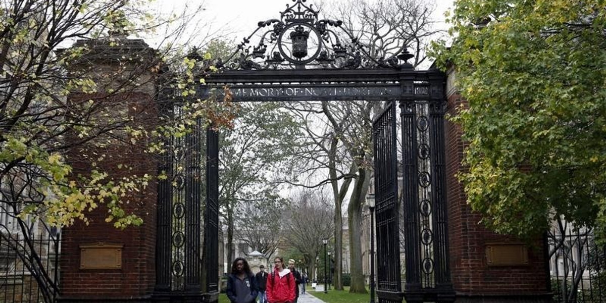 Students walk on the campus of Yale University in New Haven, Connecticut