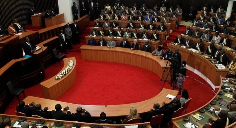 Ivory Coast's President Alassane Ouattara addresses the Ivorian parliament during the presentation of a new constitution project in Abidjan