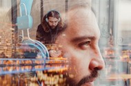 Multiple exposure photo of man with headphones