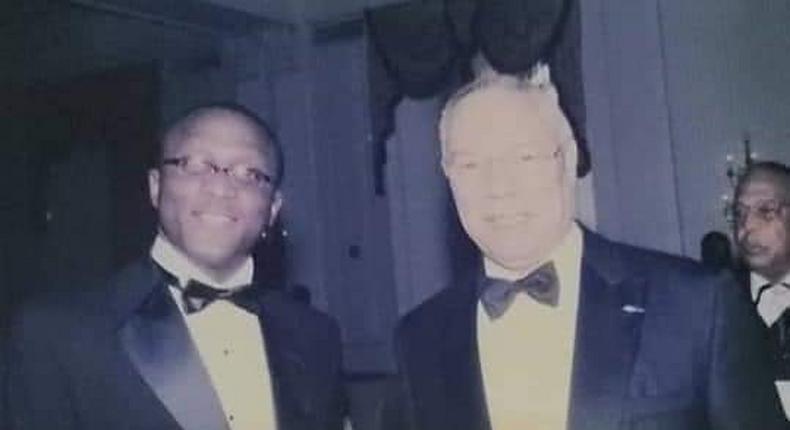 Laolu Akande (L) and Colin Powell