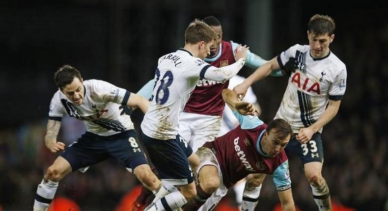 West Ham's Mark Noble in action with Tottenham's Ryan Mason, Tom Carroll and Ben Davies Action Images via Reuters / Andrew Couldridge Livepic