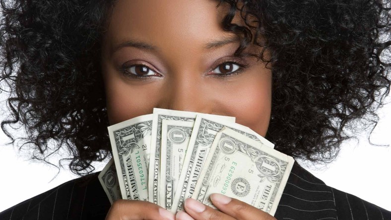 5 Things You Need To Do In 2019 To Fix Up Your Finances Pulse Nigeria - 9118449 2018 11 19 10 woman holding money