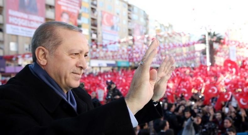 Turkish President Recep Tayyip Erdogan greets supporters at Muftuluk Square in the southeastern city of Kahramanmaras, on February 17, 2017