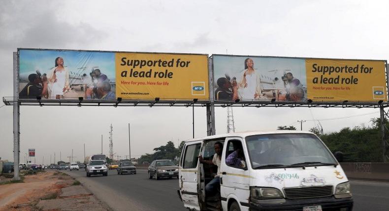 A billboard advertising MTN telecommunication company is seen along a road in Lagos November 16, 2015. (REUTERS/Akintunde Akinleye)