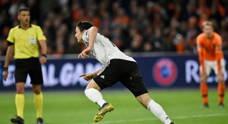 Nico Schulz spins away after scoring Germany's winner